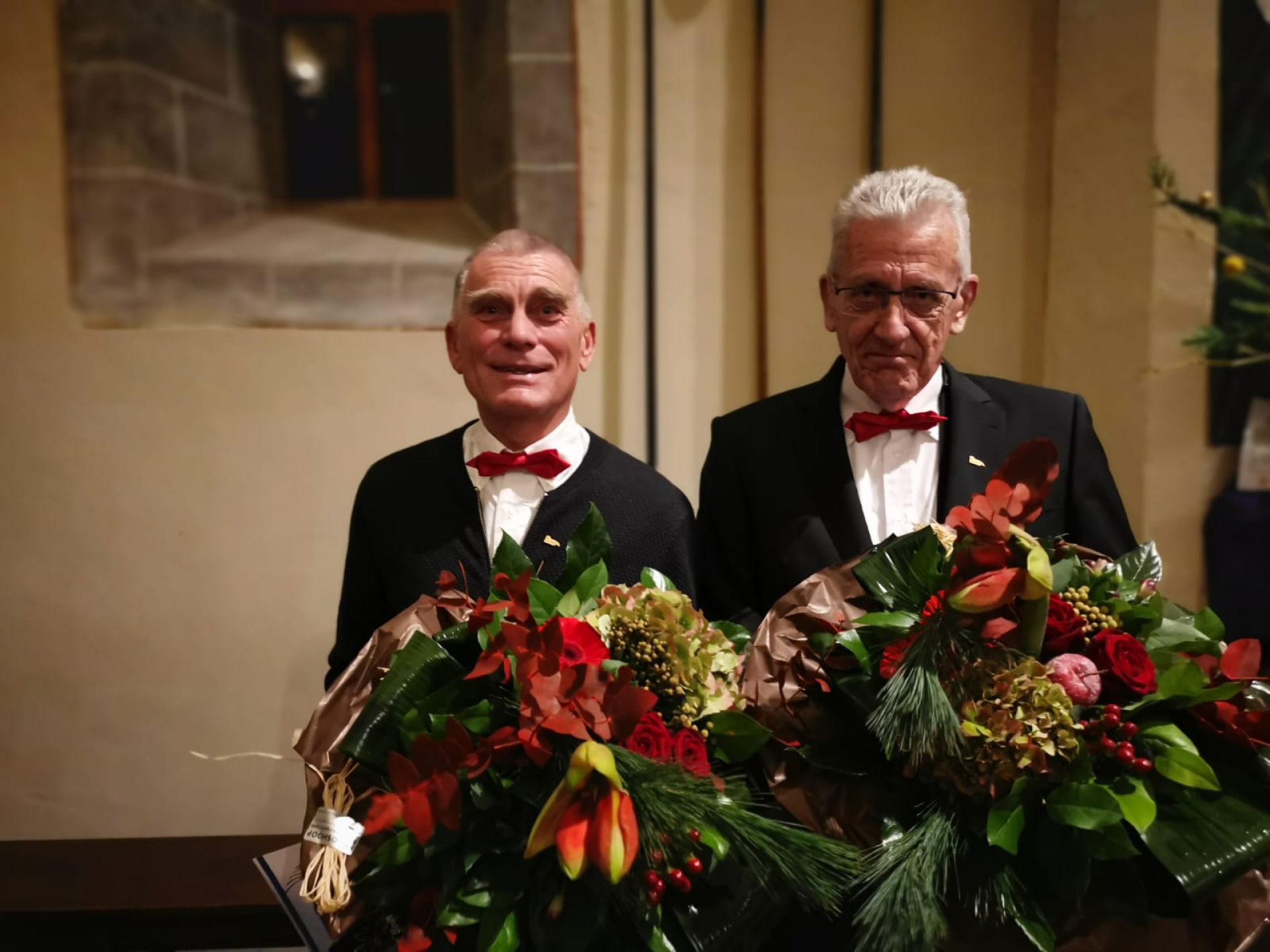 Amicitia huldigt twee jubilarissen tijdens kerstconcert